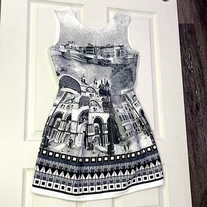 Little black an white artists tic cocktail dress with extreme detail